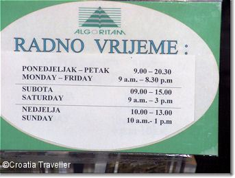 Sign showing working hours
